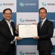Mr. Lim Boon Choon President Hexagon Manufacturing Intelligence KAI with HE Niclas Kvarnstrom Swedish Ambassdaor to Singapore May 07 2021 e1620798082329