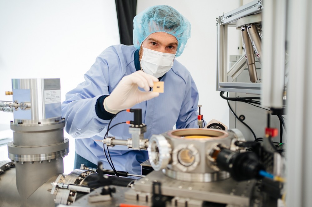 Man with Quantum Chip e1726671132990