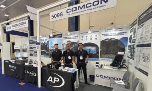 Comcon Booth at ATE scaled e1744728473505
