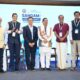 (L R) Sridhar Boovaraghavan, President, IITMAA & Chair, IITMAA SANGAM 2026 Prof. V. Kamakoti, Director, IIT Madras Deepak V Naragund, Group CFO, India Assetz Shri Pralhad Joshi, Honourable Minister of Educ